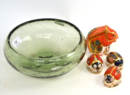 A Whitefriars green bubble glass bowl and four Royal Crown Derby paperweights - a squirrel and