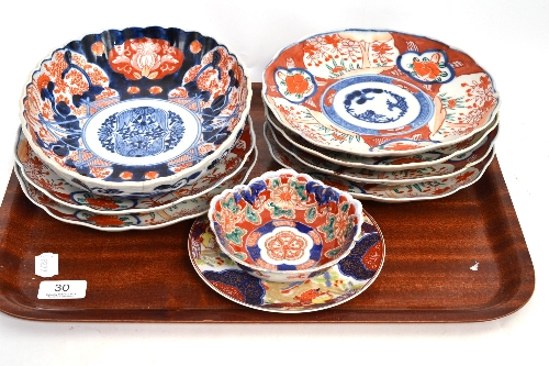 Six Japanese Imari plates, Imari large bowl, a smaller bowl and a saucer