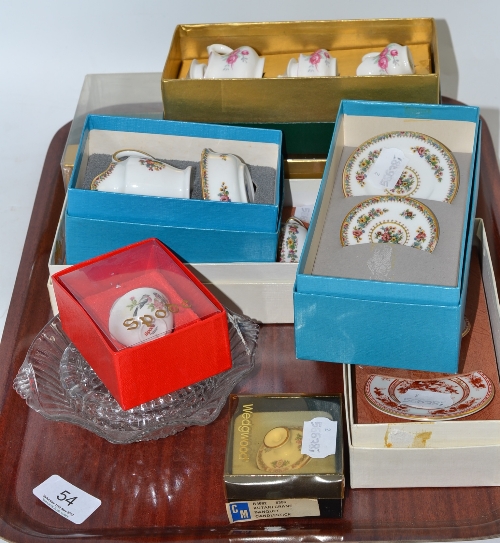 Nine boxed sets of Coalport and Wedgwood miniature tea wares and two glass dishes (on one tray)