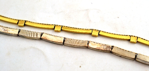 A fancy link necklace, stamped `585` and another stamped `925`