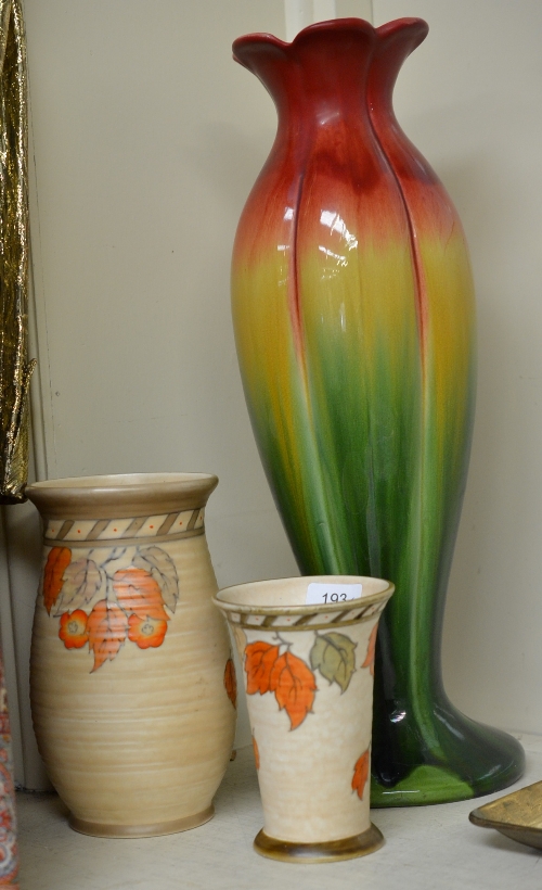 Two Crown Ducal vases, one signed C Rhead, and a pottery vase (3)