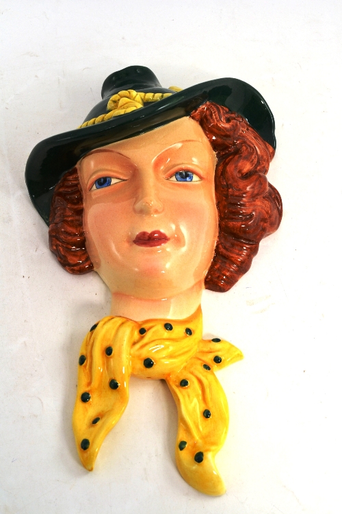 A Beswick wall mask, model No 449, impressed `Made in England 449`