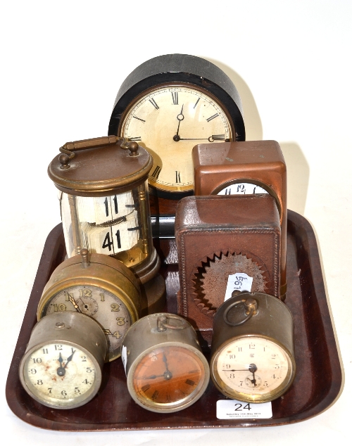 A flick timepiece, calendar timepiece, mantel timepiece, four travelling timepieces, and a leather