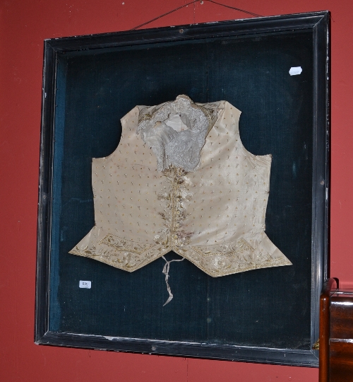 18th century silk embroidered waistcoat mounted in an ebonised frame (unglazed)
