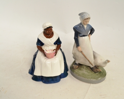 A Royal Copenhagen figure of a girl with a goose and a Royal Doulton figure `Royal Governor`s Cook`