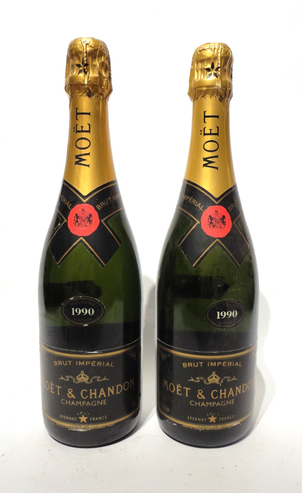 Moet and Chandon Brut Imperial 1990, vintage champagne (two bottles) U: 1.5cm inverted