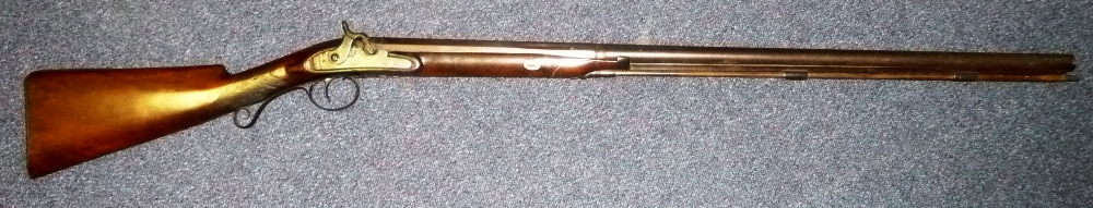 A 19th Century Percussion Cap Sporting Gun, the 82.5cm steel barrel octagonal at the breech, the