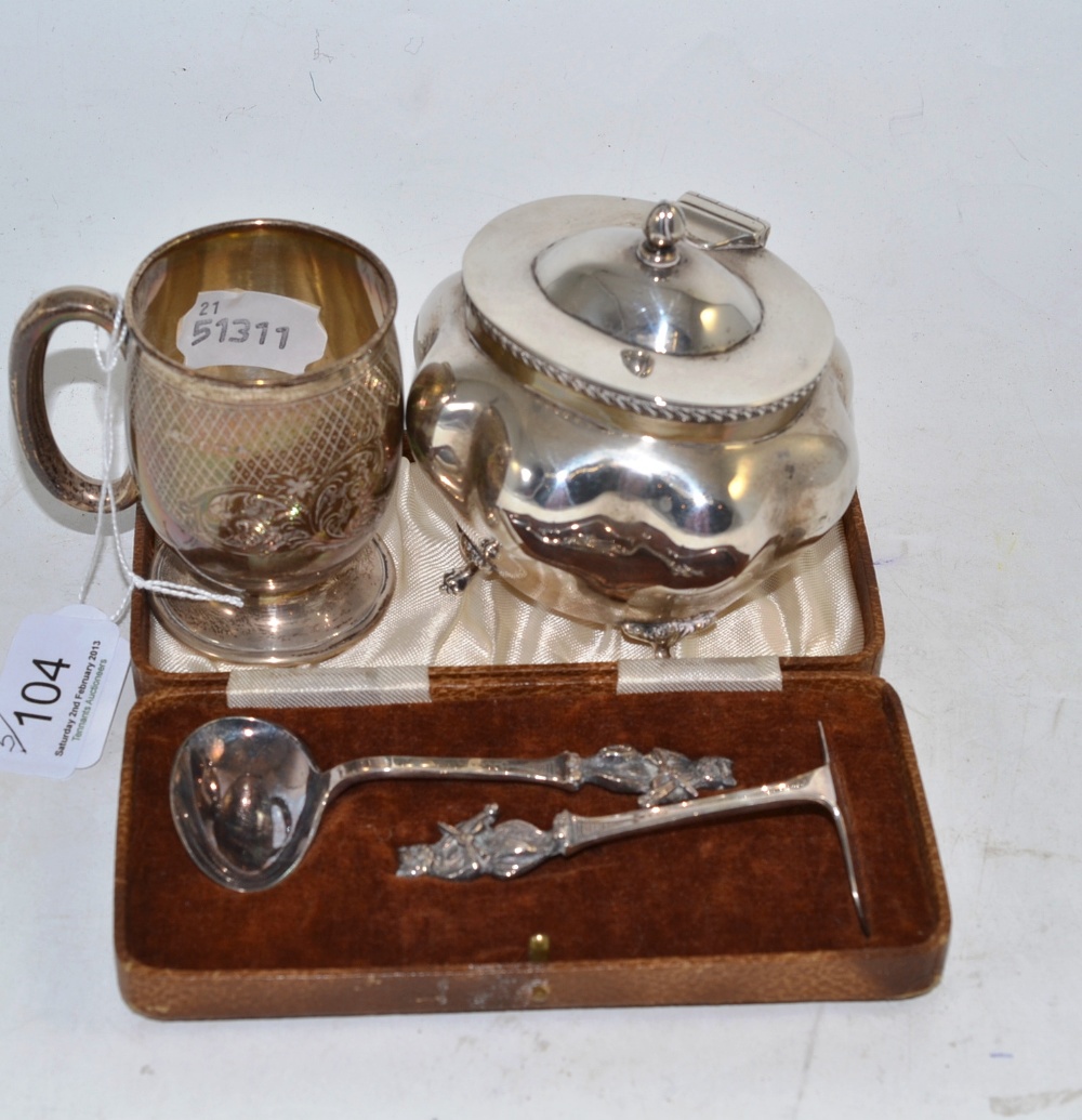 Lobed and hinged silver tea caddy (marks rubbed), cased silver plated child`s spoon and pusher `