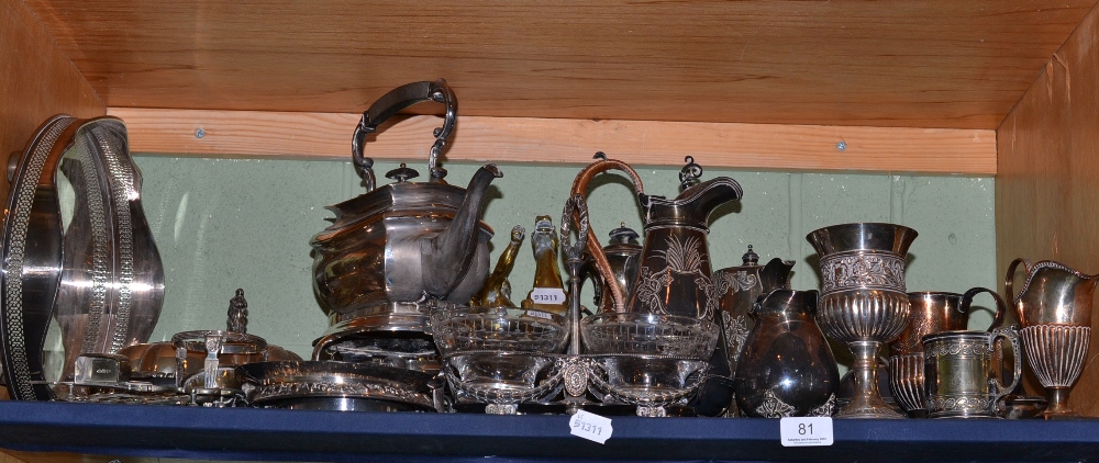 Shelf of plated wares including spirit kettle on stand, two handled tray, goblets etc