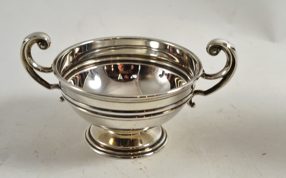 An Edward VII small two handled cup, Asprey, Birmingham 1906, 14cm wide