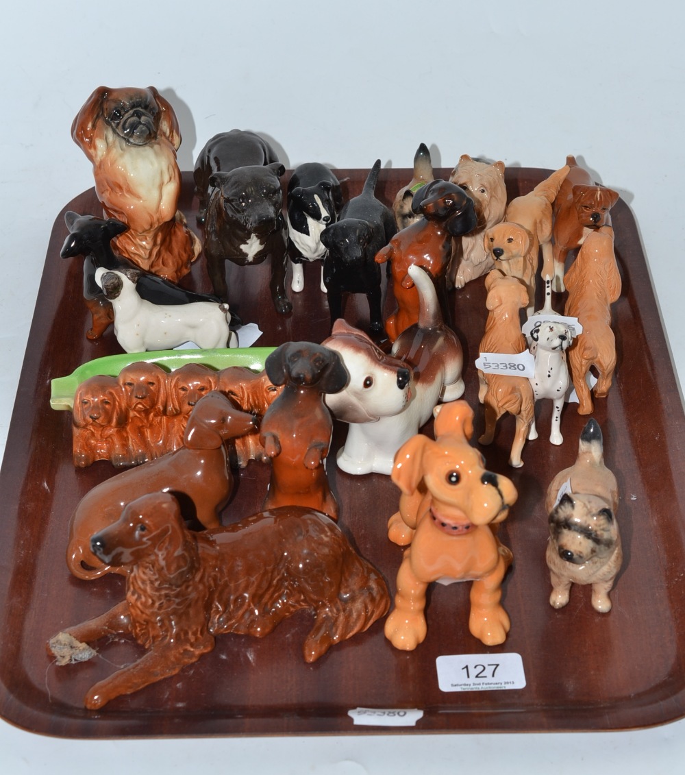 Twenty one assorted small Beswick dog figures