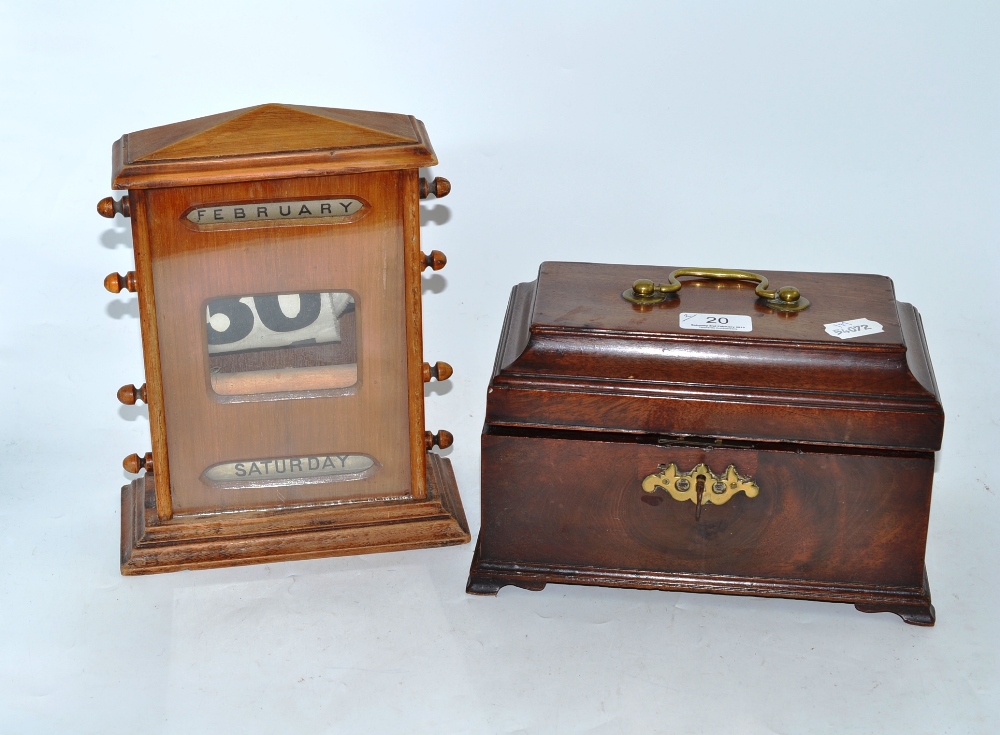 A George III mahogany tea caddy (a.f.) and a walnut perpetual desk calendar (2)