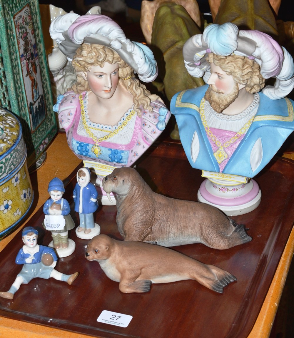 A pair of French bisque busts, an Aynsley seal, an Aynsely walrus and three small Continental