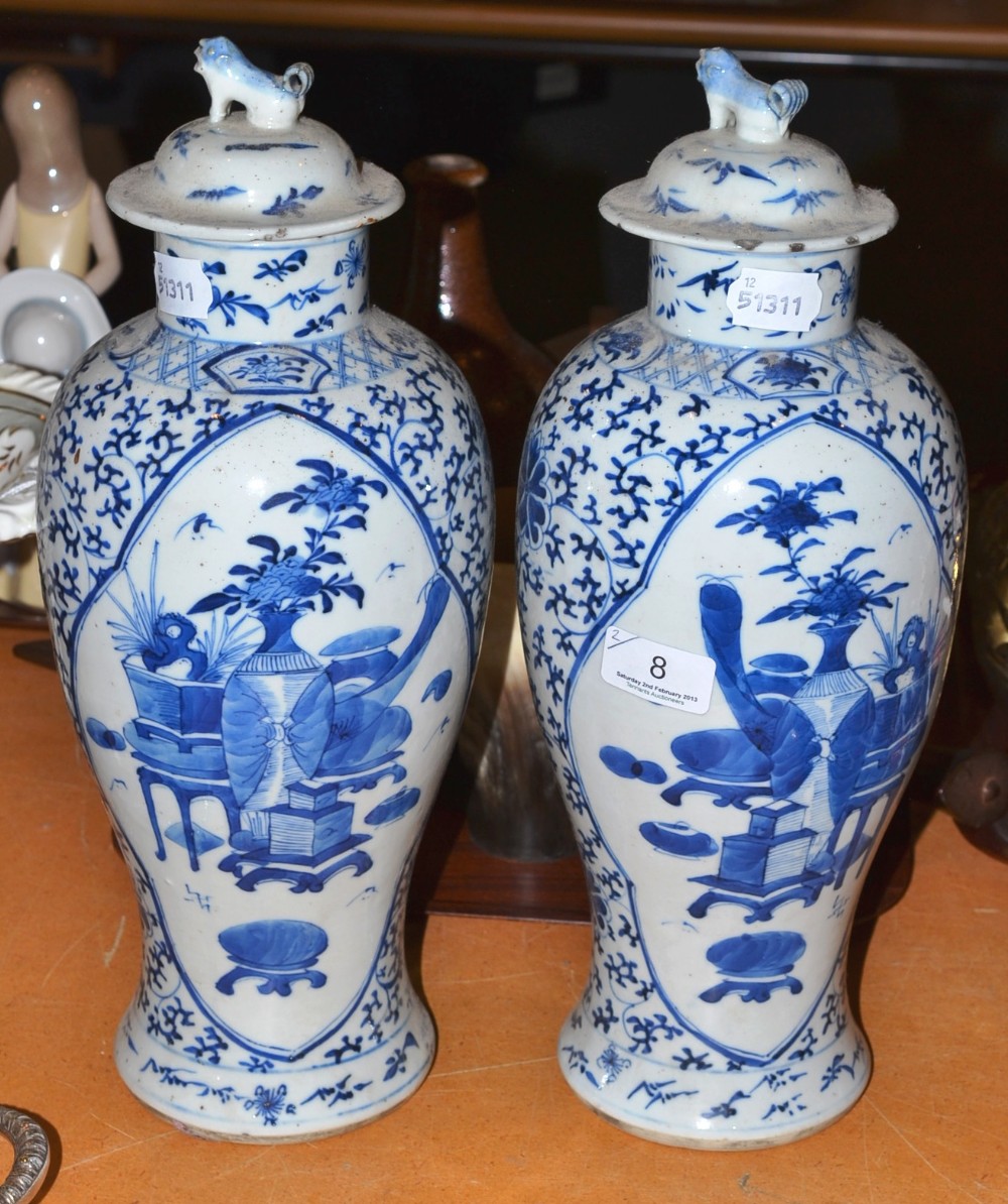 Pair of Chinese blue and white baluster vases and covers