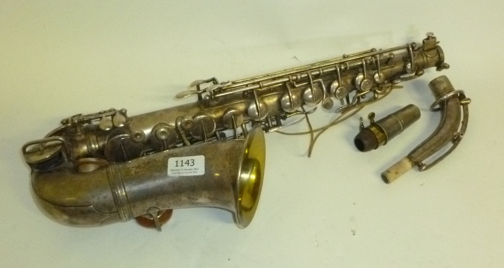 A Silver Plated Alto Saxophone by Boosey & Co., London, serial number 17102, with mouthpiece, in a