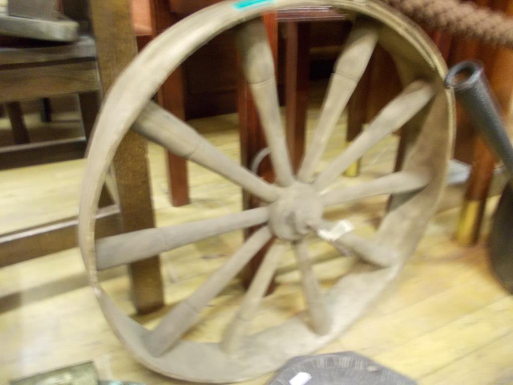 Lead Sundial and a Barrow Wheel