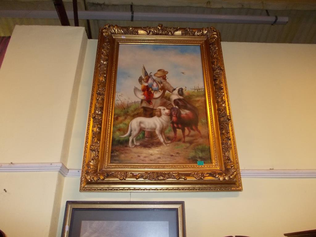 Large Gilt Framed Picture of a Hunting Man with dogs and the catch with dogs and the catch