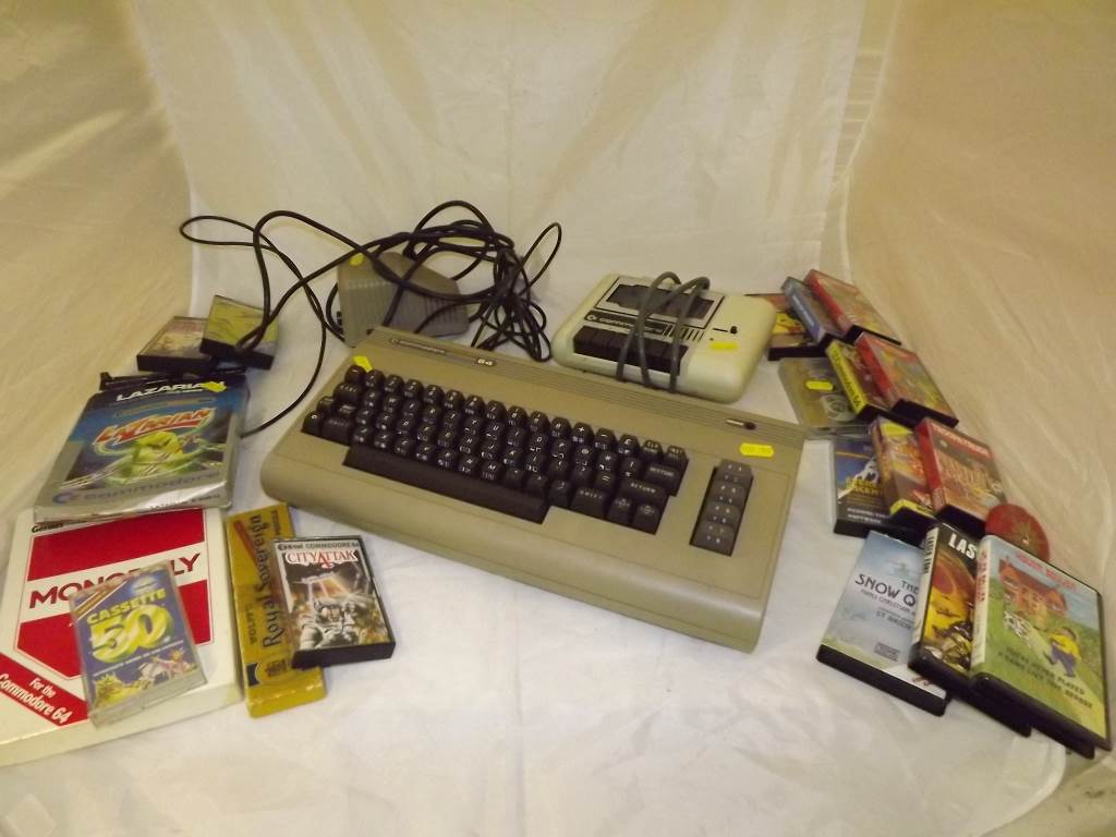 A Commodore 64 games console / computer with games, accessories and other (qty)
