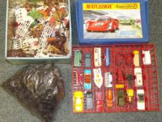 A Matchbox collectors mini-case containing 22 vintage Matchbox diecast models, a box of vintage