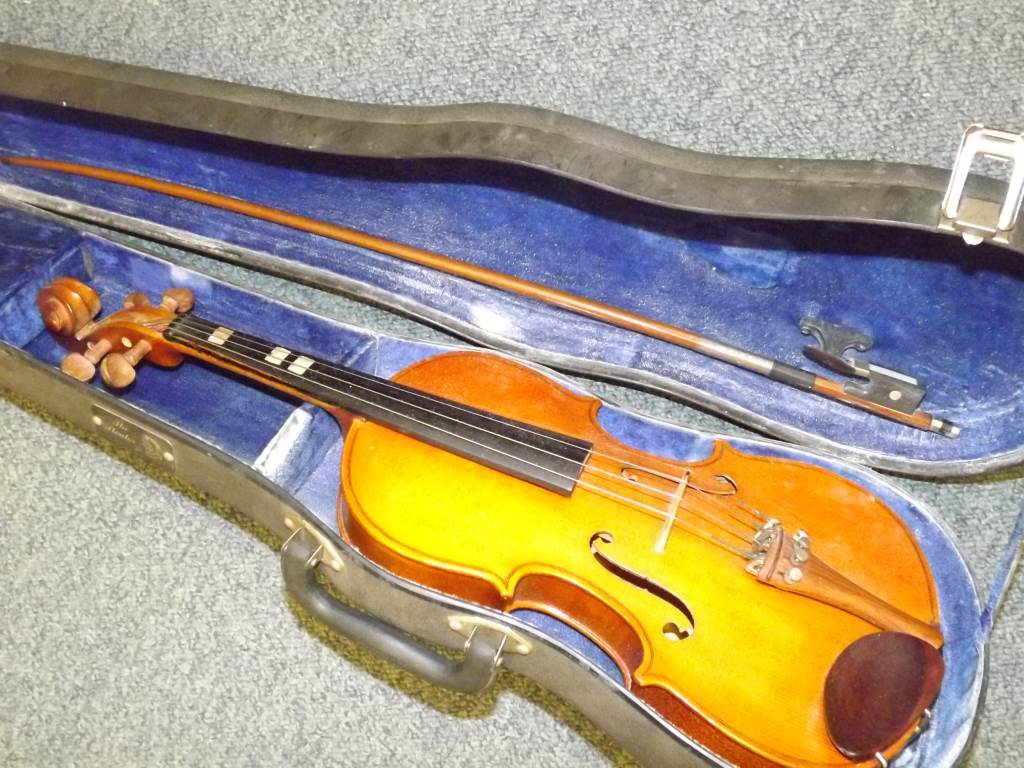 A violin and bow in hard case, the paper label within marked The Stentor Student, England, half