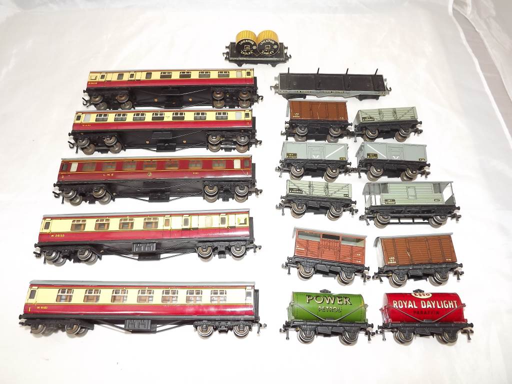 Model railways - a quantity of OO gauge Hornby Dublo rolling stock comprising twelve tin-plate and