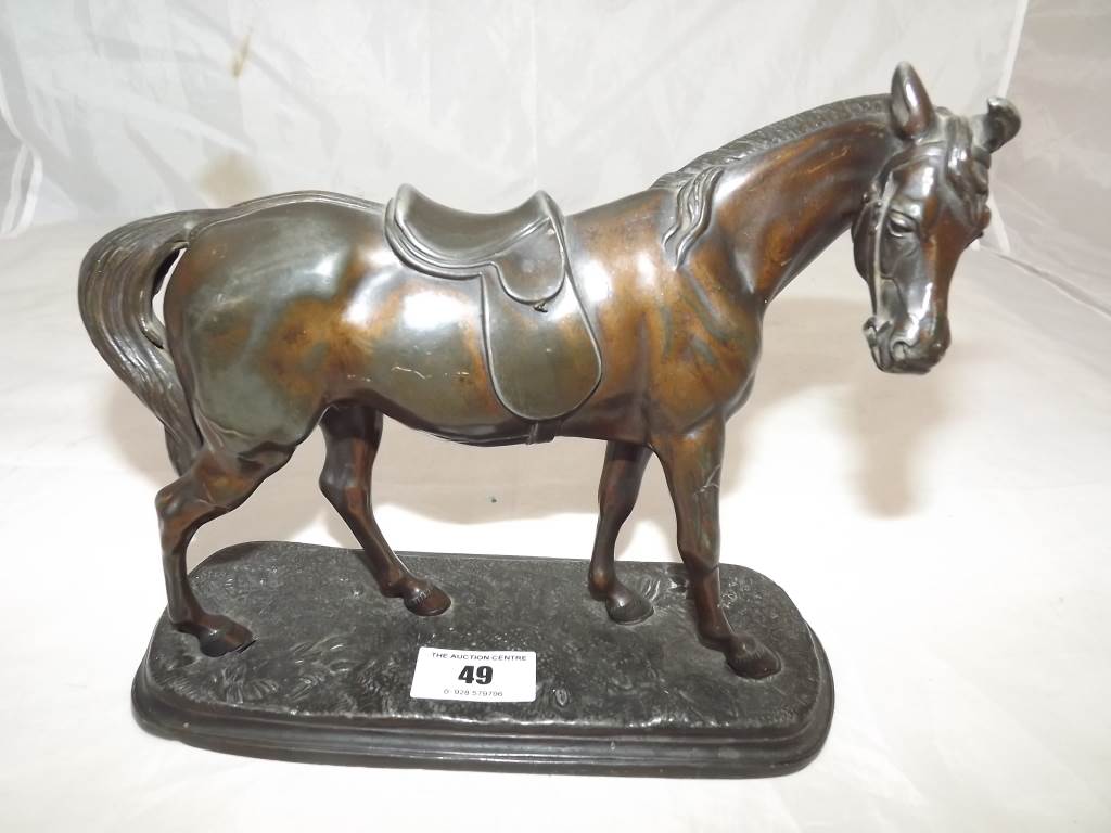 A bronze sculpture depicting a stallion 17cm (h)