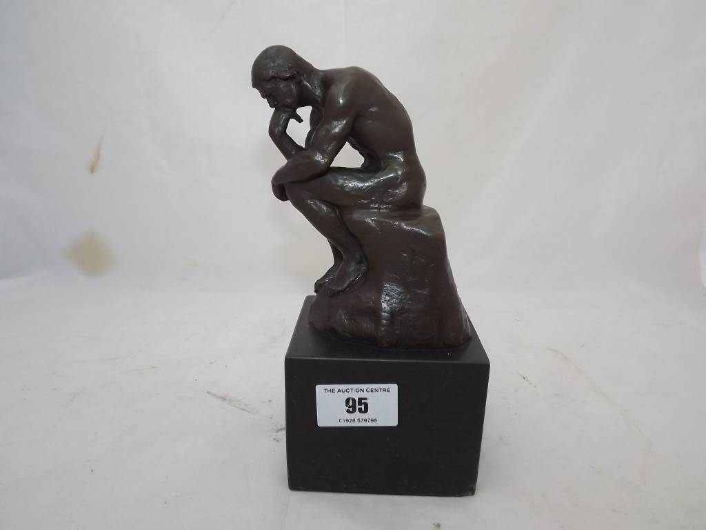 A hot cast bronze depicting The Thinker on an Italian marble base 20cm (h)