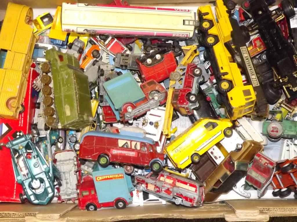A collection of playworn vintage die-cast model motor vehicles to include Corgi Chipperfields, other