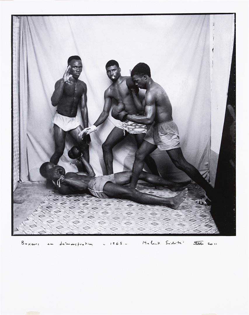 Malick Sidibé, (b. Mali, 1935) Silver gelatin print Signed and dated `Malick Sidibé 2011` (lower