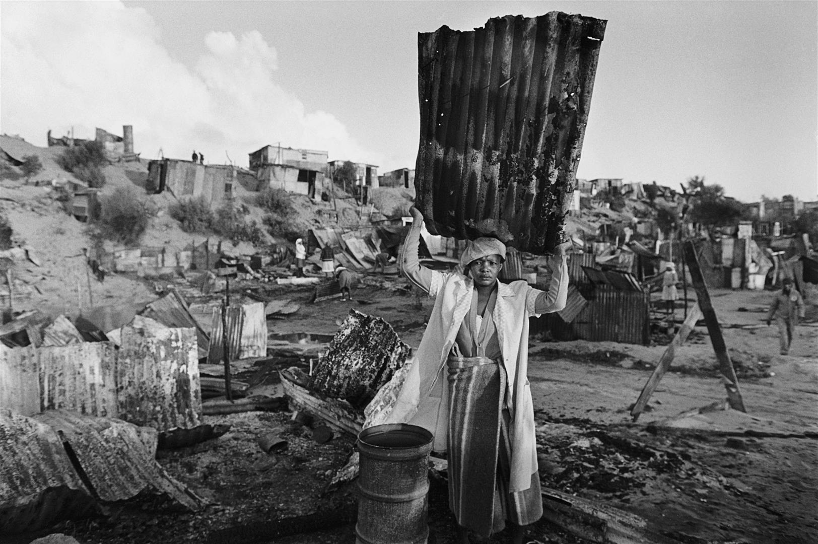 Gideon Mendel, (b. South Africa, 1959) (Taken during conflict in KTC Squatter Camp)Signed and