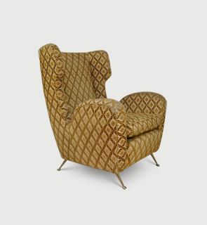 Wingback armchair Italy c,1950 Large Italian wingback armchair with lacquered brass legs and in