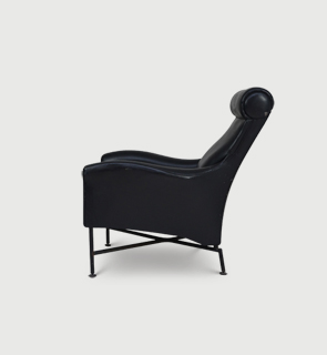 Sculptural armchair Italy c,1955 A masculine armchair in original vinyl covering fixed to a