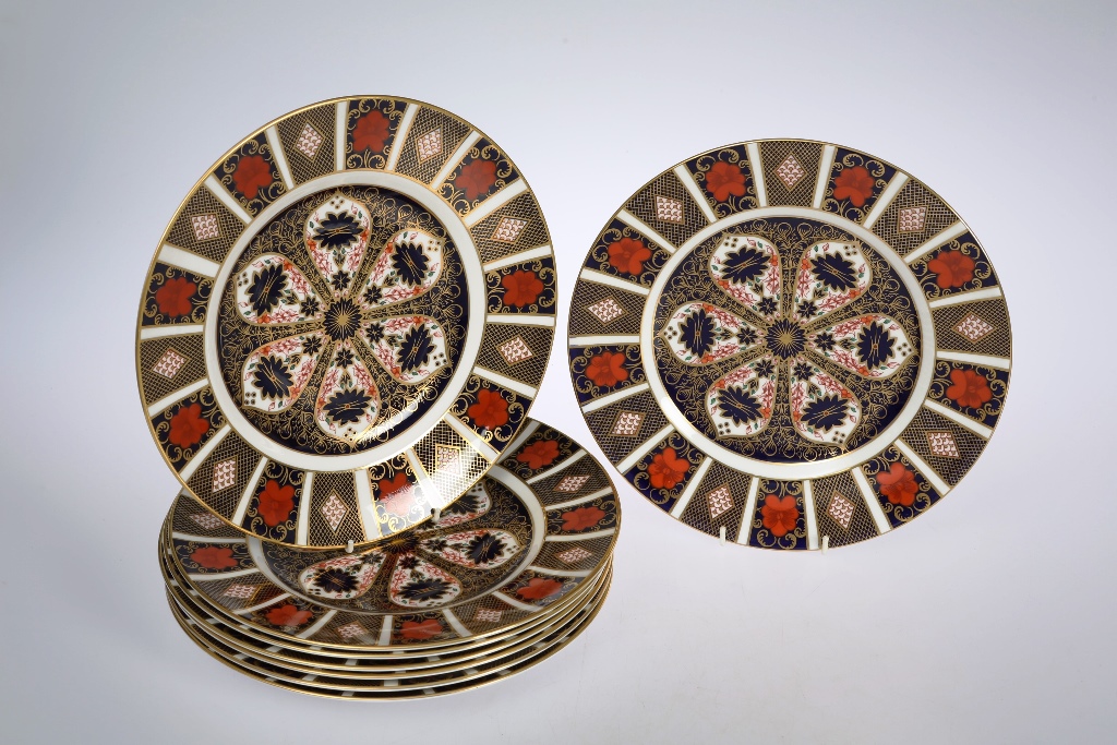 A set of eight Royal Crown Derby Imari pattern plates, each decorated with pattern no. 1128, red