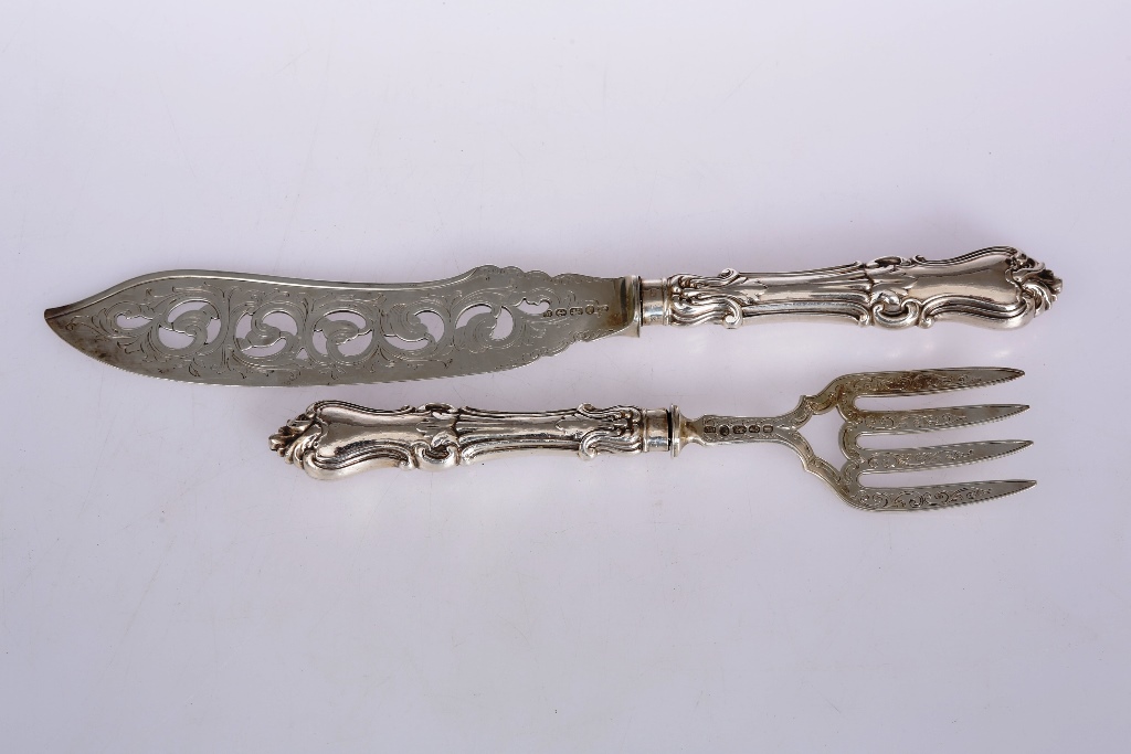 A pair of Victorian silver fish servers, John Gilbert, Birmingham 1861, the hallmarked blade and