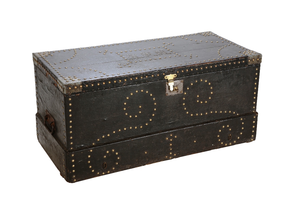 A 19th century brass studded leather travelling trunk, the hinged rectangular lid with the