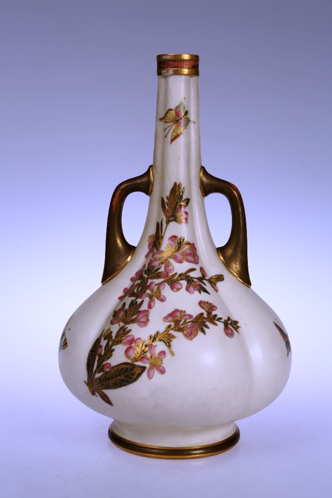 A Royal Worcester vase, late 19th century, the two handled lobed body painted with butterflies and