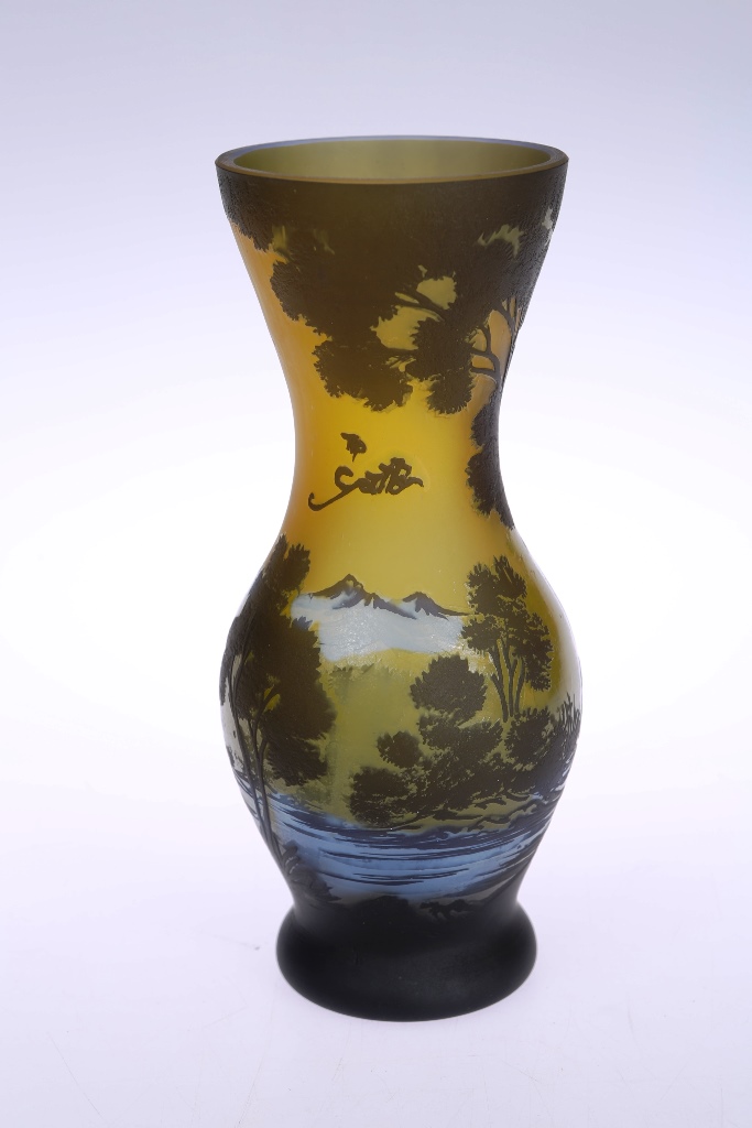 A Galle Tip cameo vase, of baluster form with flared neck, cased in brown and blue with a river