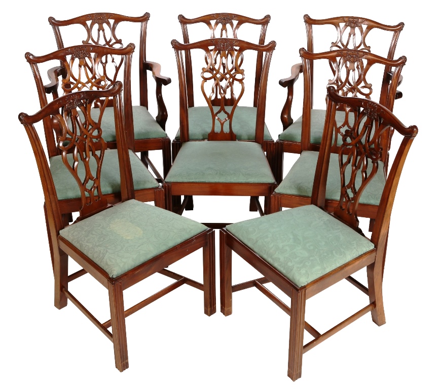 A set of eight Chippendale style mahogany dining chairs, including a pair of carvers, each yoked