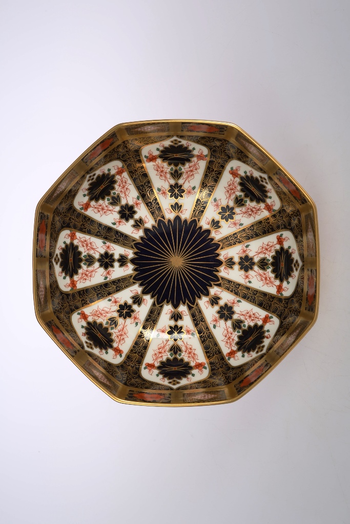 A Royal Crown Derby bowl, the octagonal body decorated in an Imari palette, highlighted with
