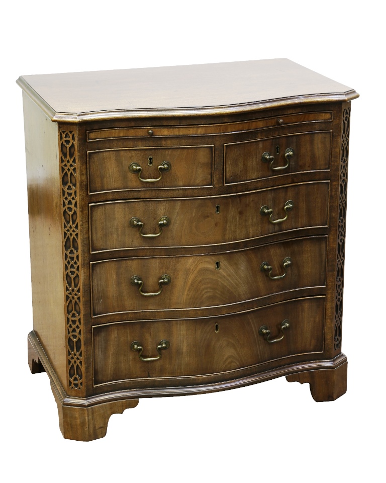 A George III style mahogany chest of drawers, of small proportions, the moulded top with