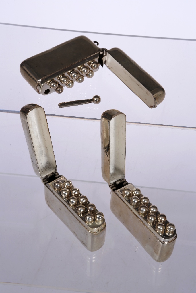 Three silver cased sets of shooting butt markers, Birmingham 1990, maker TT, each hinged case