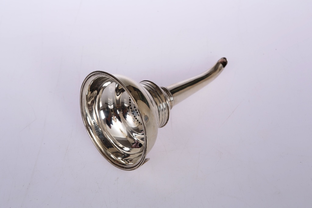 A George III silver wine funnel, John Lambe, London 1800, the two pieces with reeded edges. 11.5cm