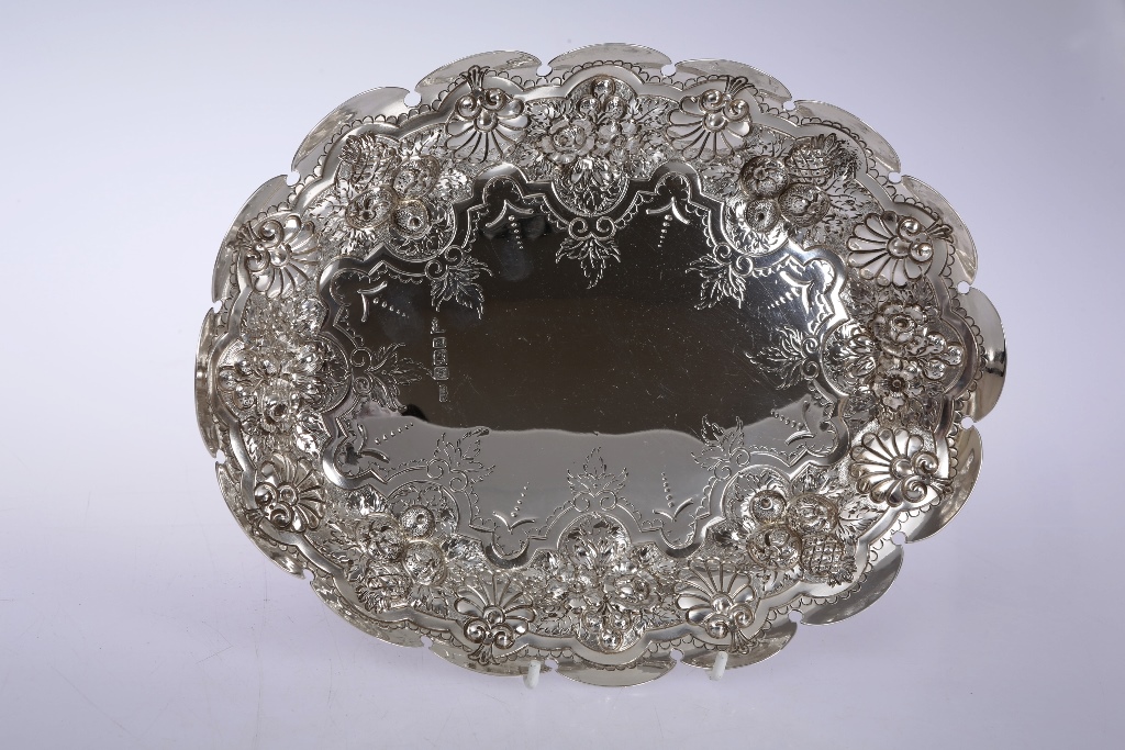 A late Victorian silver dish, Walker & Hall, Sheffield 1892, of oval form with arcaded rim above