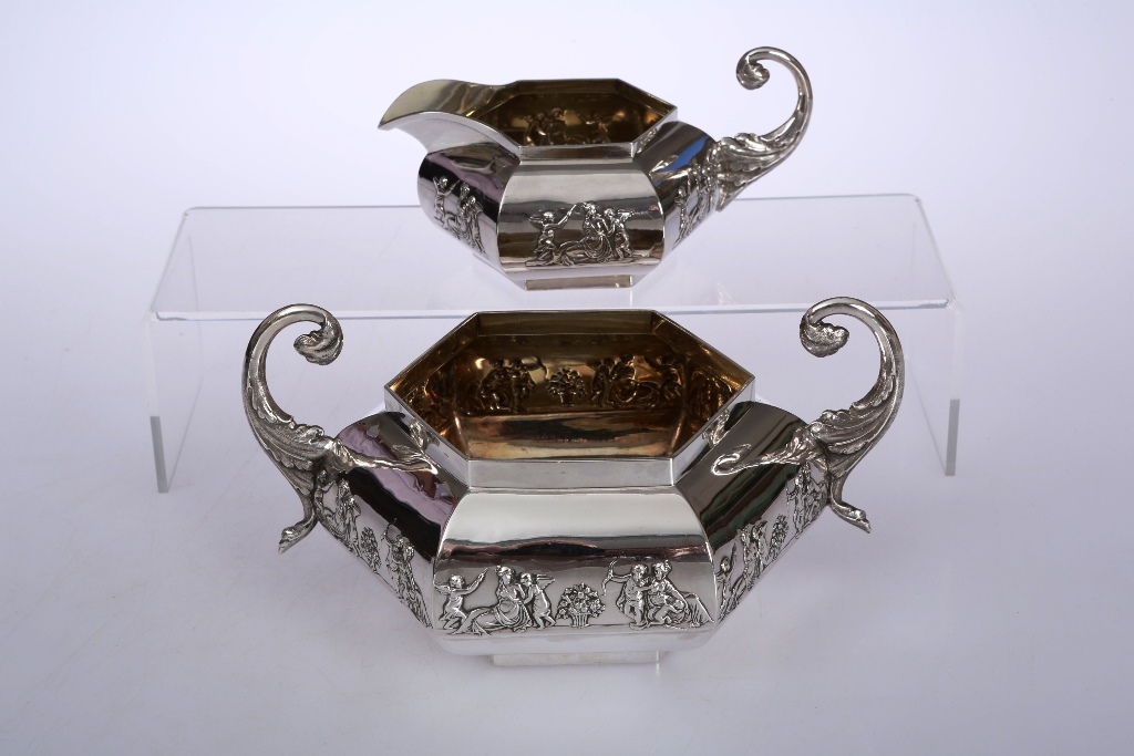 A George III silver two handled sugar bowl and cream jug, London 1805, maker TH, each of hexagonal