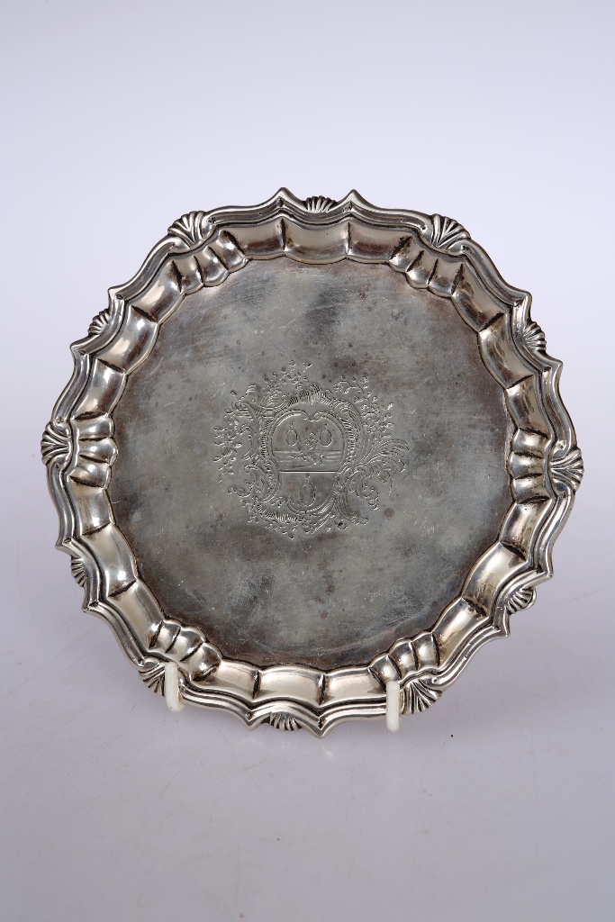 A George II silver waiter, Robert Abercromby, London 1740, with pie crust rim, engraved with a
