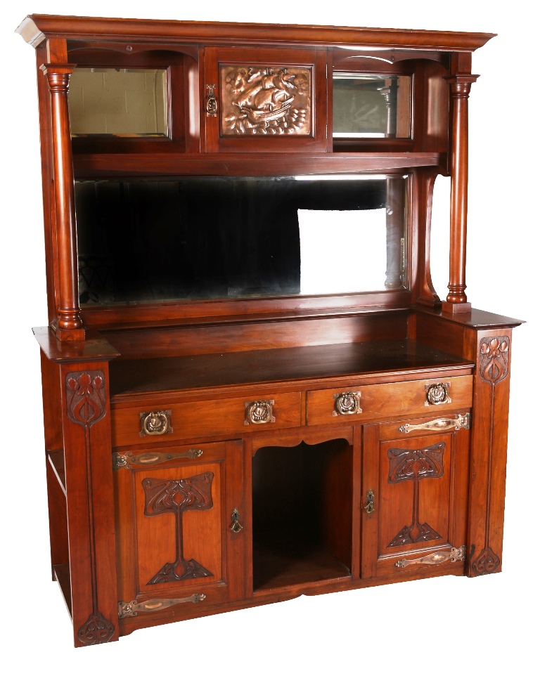 An Art Nouveau mahogany mirror-back sideboard, the superstructure with projecting canopy above a