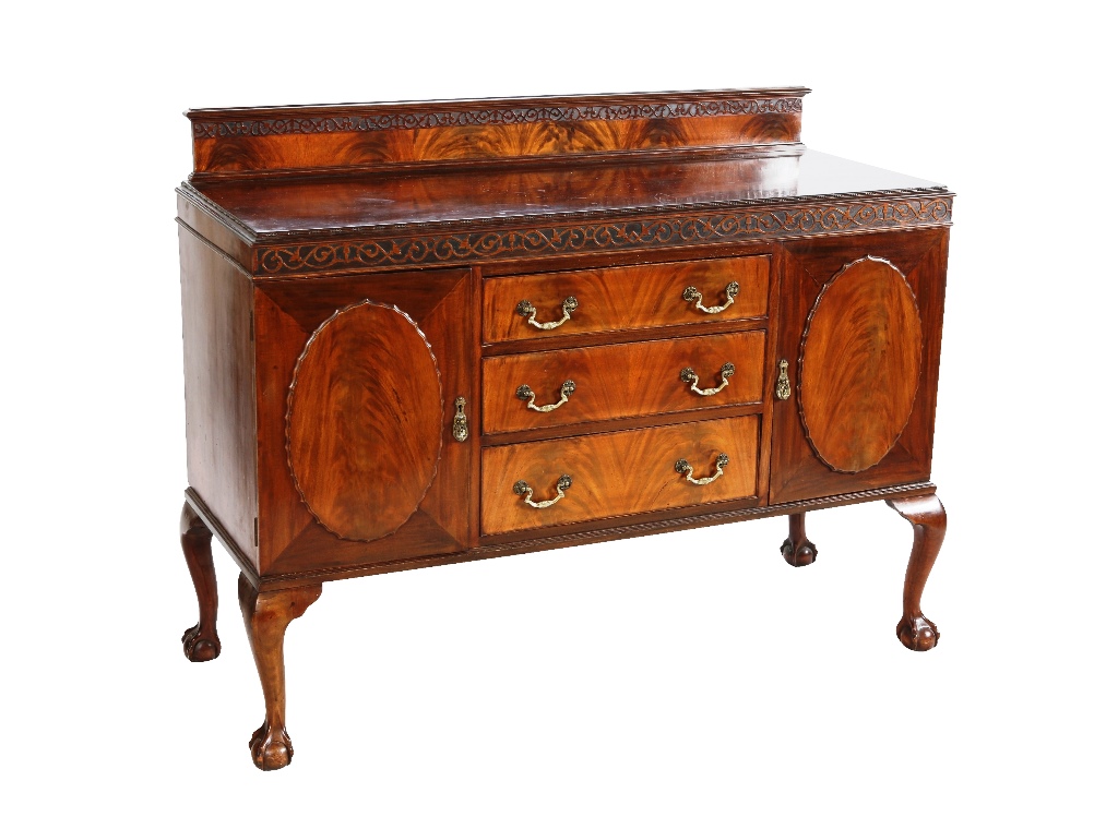 A Chippendale style mahogany sideboard, the moulded rectangular top with blind fretwork carved