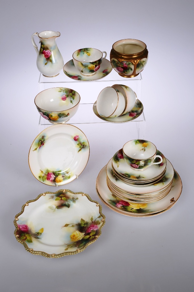 A group of Royal Worcester rose painted table wares, comprising a pair of plates, signed M Blake,