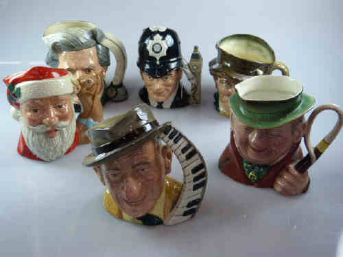 Five Royal Doulton Character Jugs 'Paddy', 'Mark Twain', 'The London Bobby', 'Santa Claus' and '