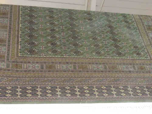 Green ground Bokhara Rug, 2.30m x 1.50m